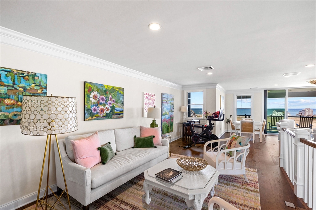 148 Hatherly Road, Unit 148 Scituate, MA 02066 - Photo 28 of 42 a living room with furniture and wooden floor