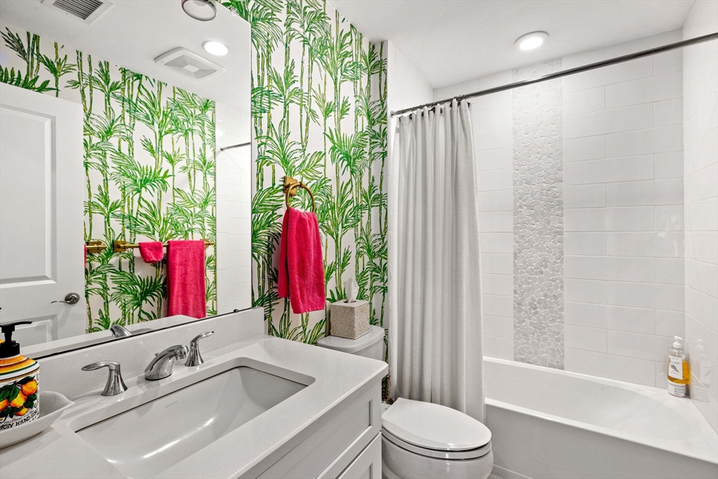 148 Hatherly Road, Unit 148 Scituate, MA 02066 - Photo 29 of 42 a bathroom with a bathtub sink and toilet