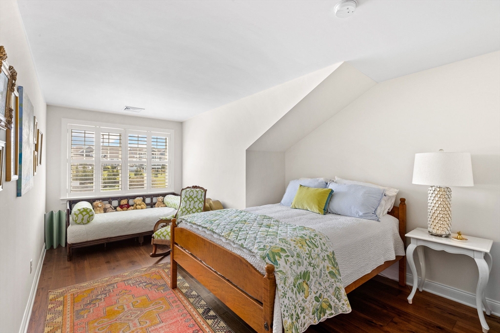 148 Hatherly Road, Unit 148 Scituate, MA 02066 - Photo 31 of 42 a bedroom with a bed and a couch