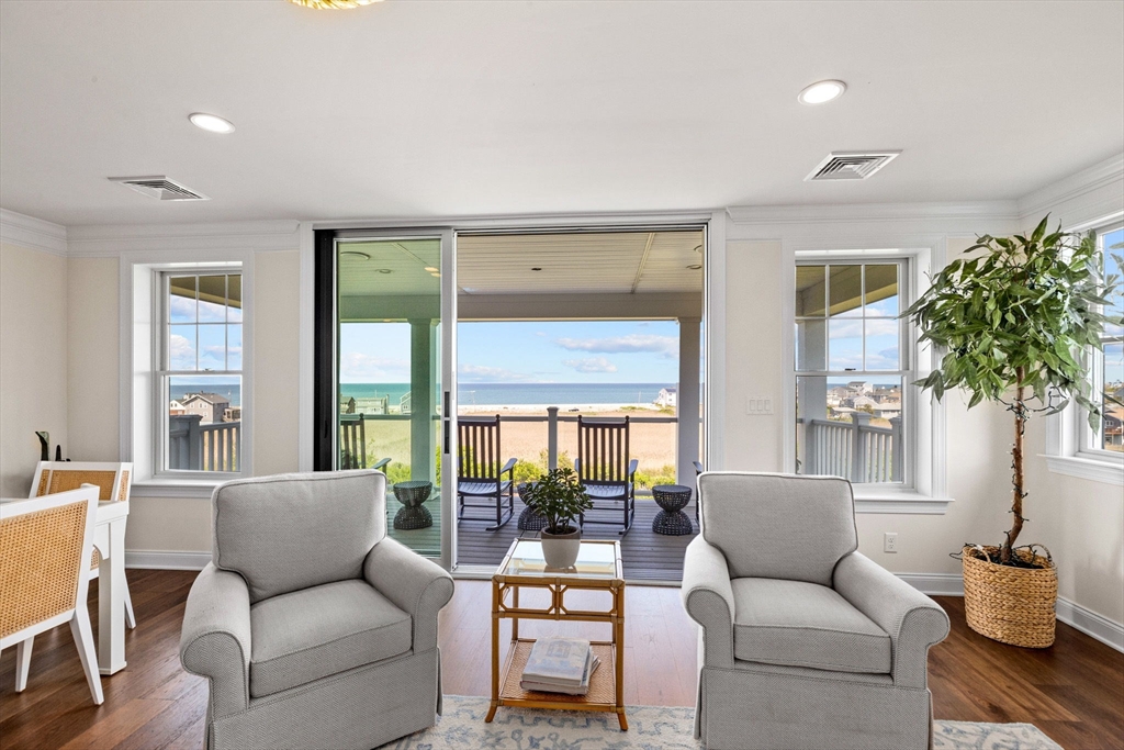 148 Hatherly Road, Unit 148 Scituate, MA 02066 - Photo 32 of 42 a living room with furniture and a potted plant
