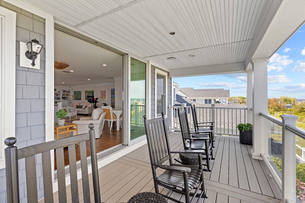 148 Hatherly Road, Unit 148 Scituate, MA 02066 - Photo 33 of 42 a view of a porch with furniture