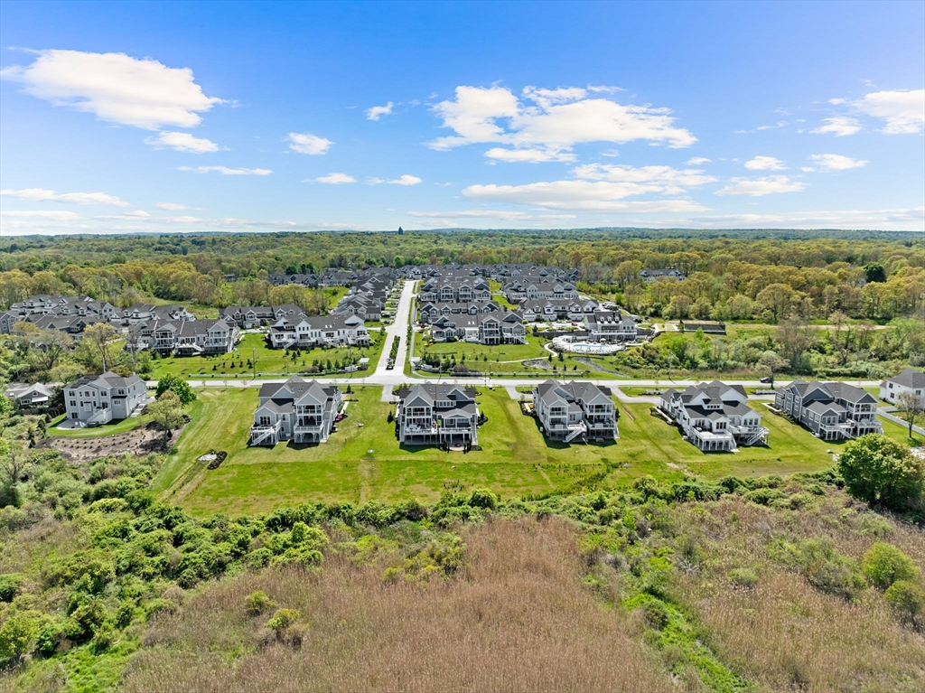 148 Hatherly Road, Unit 148 Scituate, MA 02066 - Photo 39 of 42 a view of a city with lots of residential buildings ocean and mountain in the back