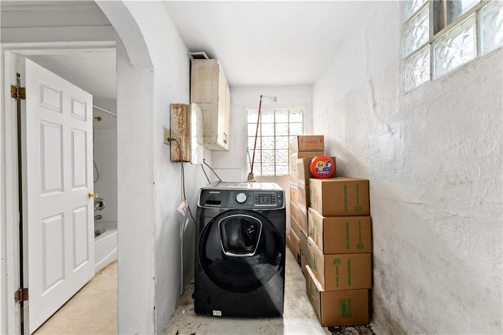 308 Merrimac Street Pittsburgh, PA 15211 - Photo 11 of 43 a view of walk in closet with clothes and shoes