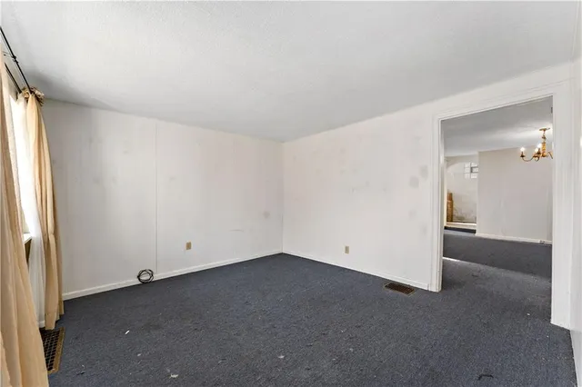 an empty room with a natural light