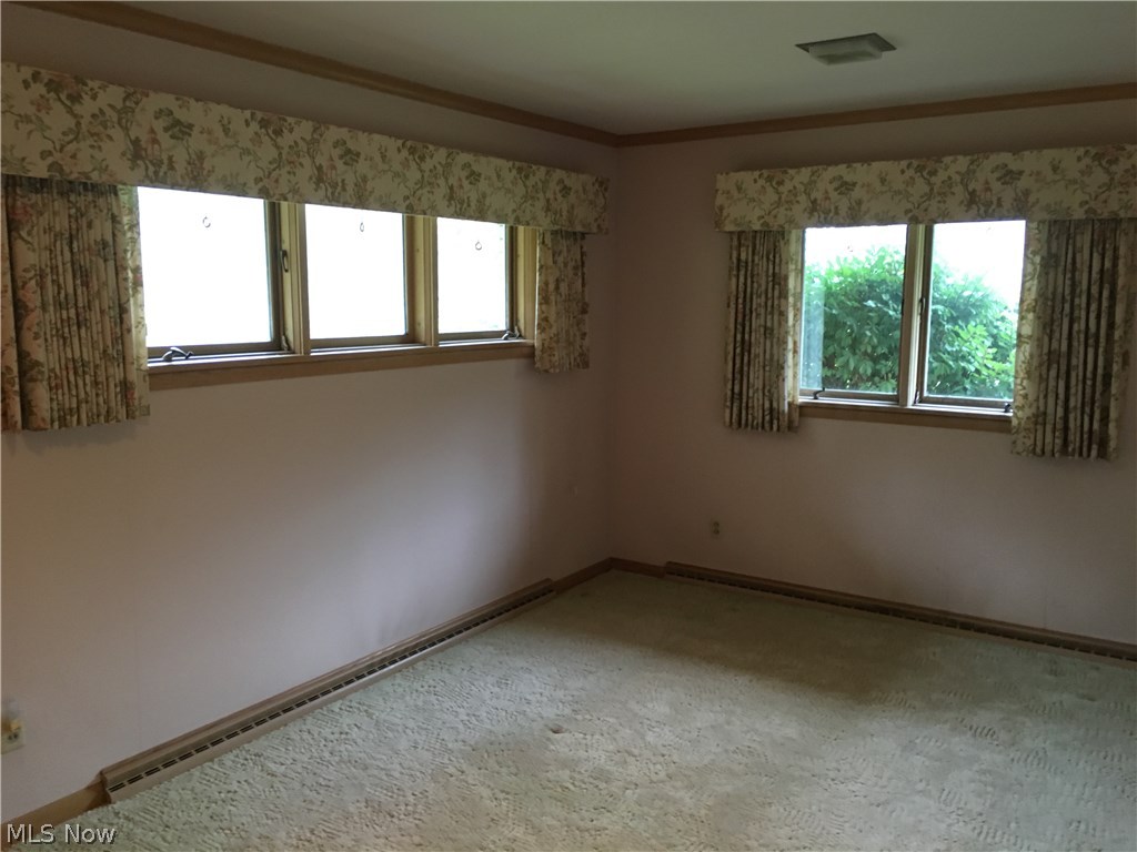 7457 Warren - Sharon Road Brookfield, OH 44403 - Photo 10 of 24 Hardwood floors beneath all carpet.