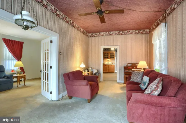 a living room with furniture and a couch