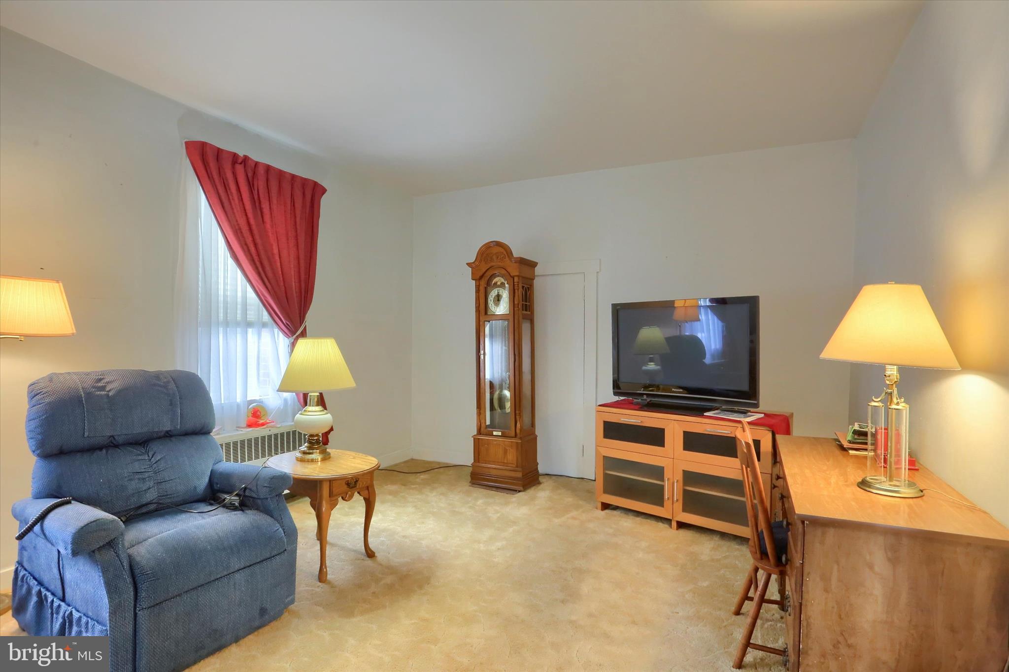 204 South Market Street Liverpool, PA 17045 - Photo 6 of 38 a living room with furniture and a flat screen tv