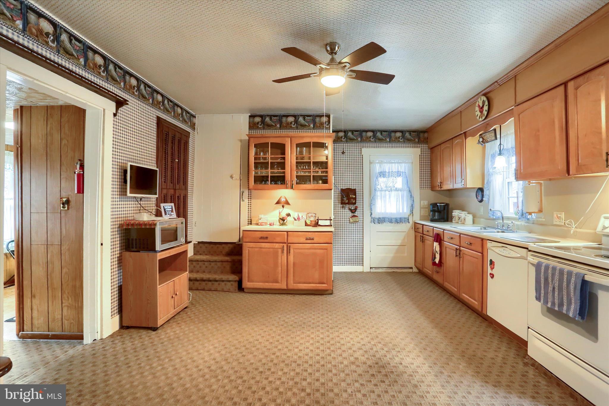 204 South Market Street Liverpool, PA 17045 - Photo 7 of 38 a large kitchen with stainless steel appliances granite countertop a stove and a sink