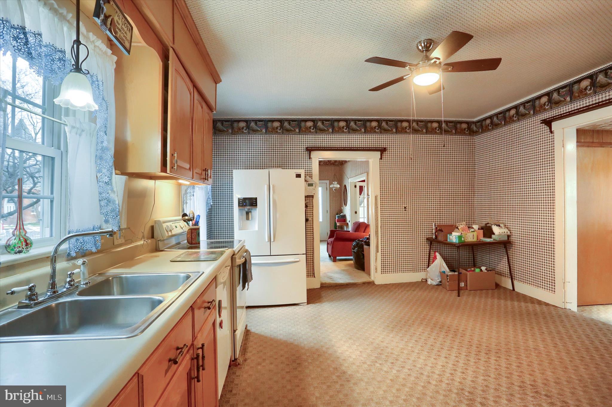 204 South Market Street Liverpool, PA 17045 - Photo 8 of 38 a kitchen with sink refrigerator and cabinets