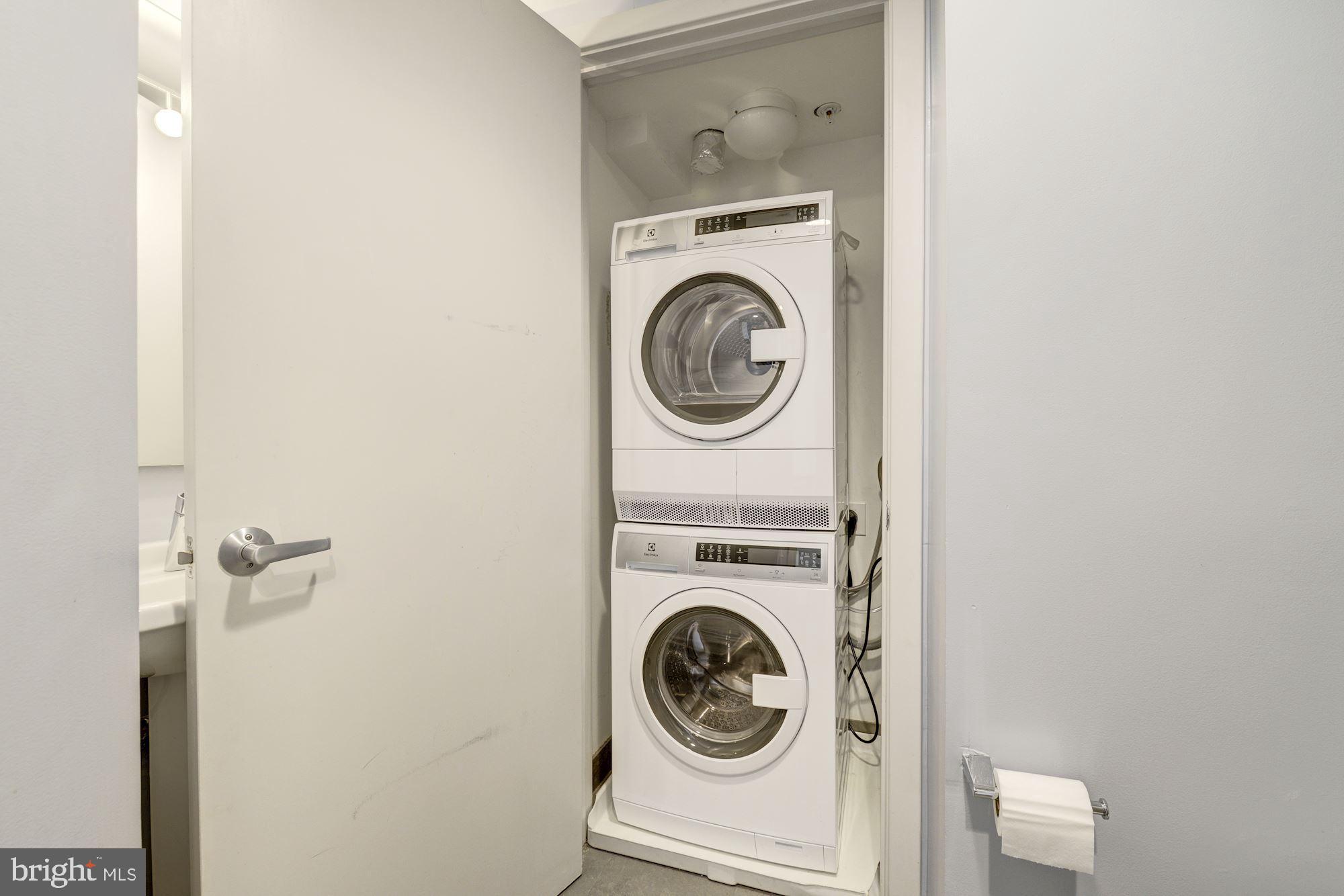 1466 Harvard Street Northwest, Unit A2 Washington, DC 20009 - Photo 8 of 21 a utility room with dryer and washer
