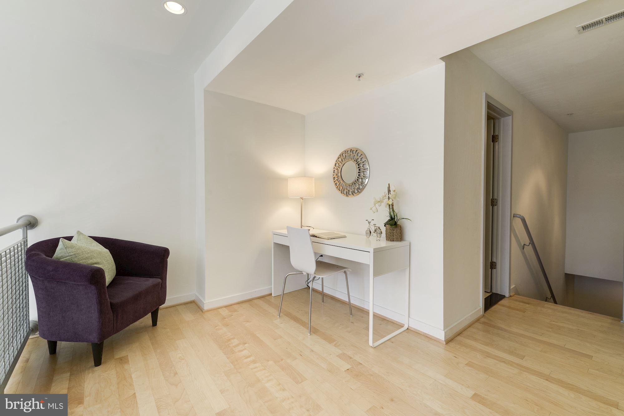 1466 Harvard Street Northwest, Unit A2 Washington, DC 20009 - Photo 10 of 21 a living room with furniture