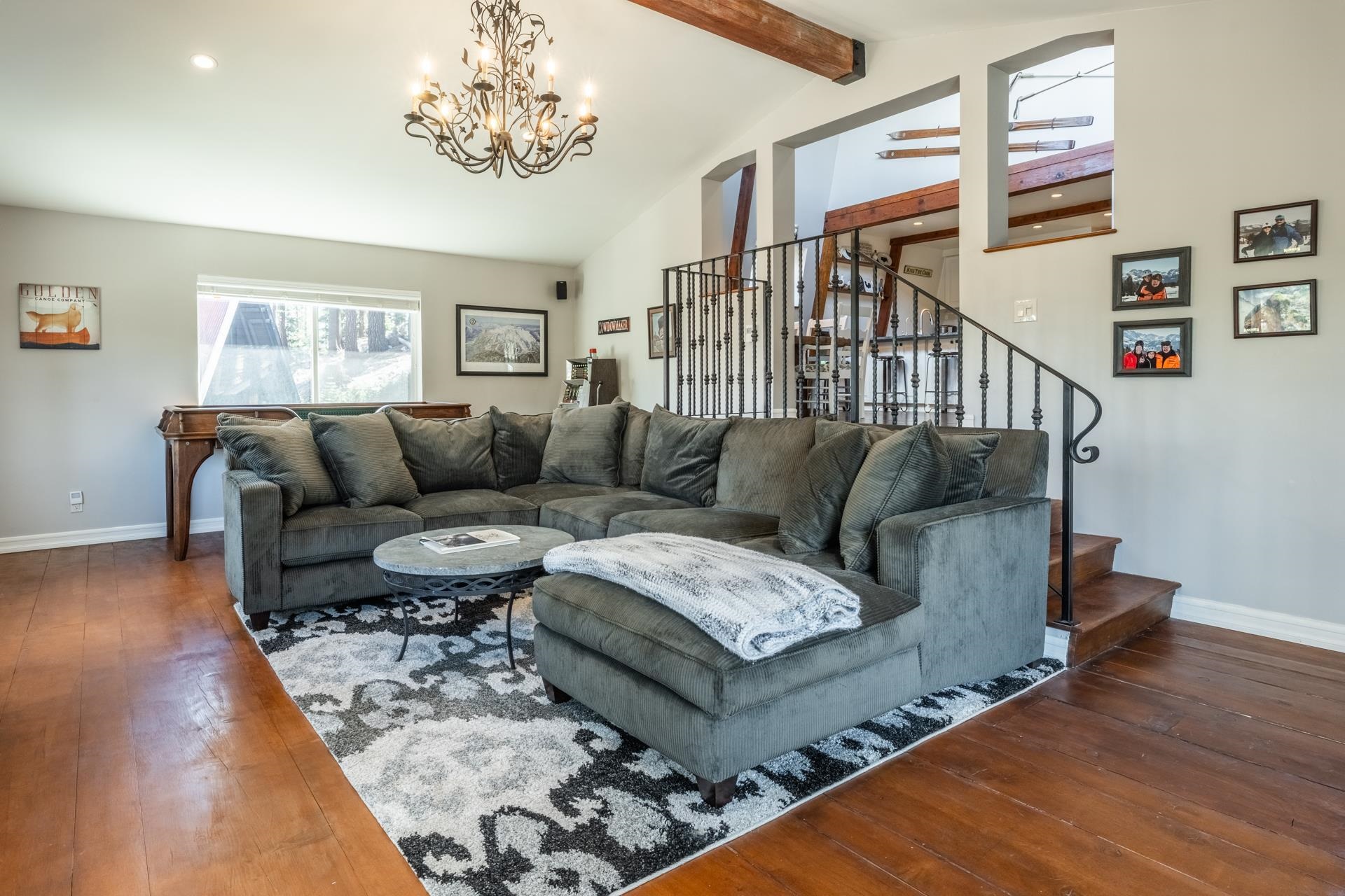 349 Davison Road Mammoth Lakes, CA 93546 - Photo 12 of 43 Living area with dark wood finished floors, stairs, and a chandelier