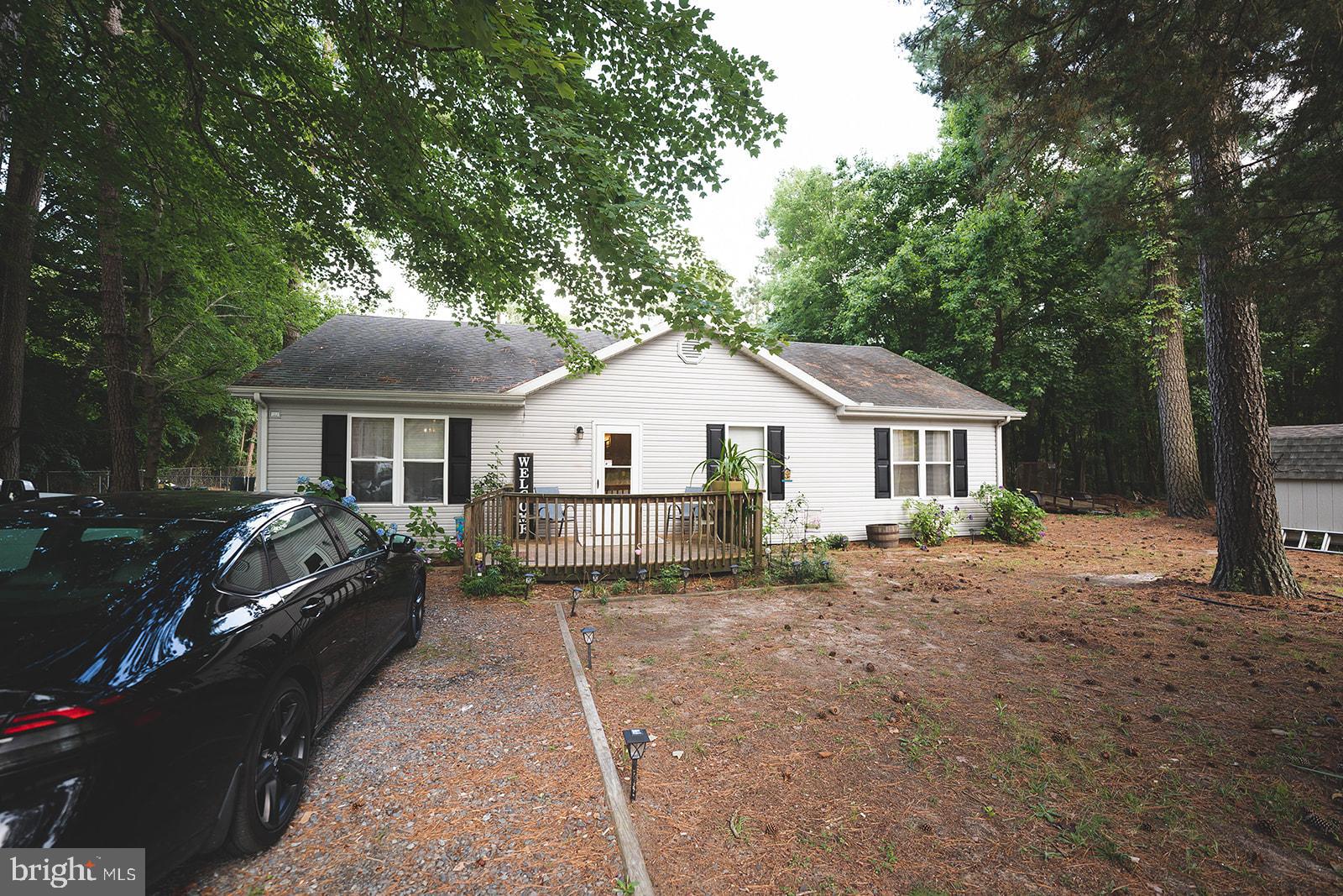 21831 Wetipquin Road Quantico, MD 21856 - Photo 1 of 57 a front view of a house with a yard