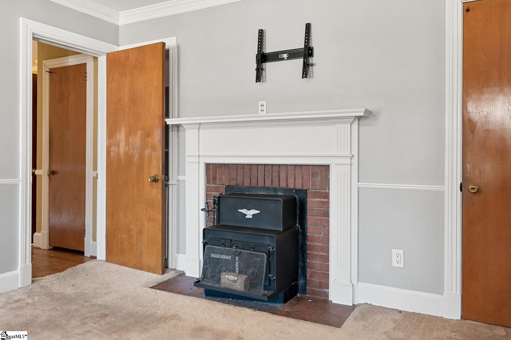 310 River Street Belton, SC 29627 - Photo 46 of 50 Primary Bedroom - offers built-in fireplace