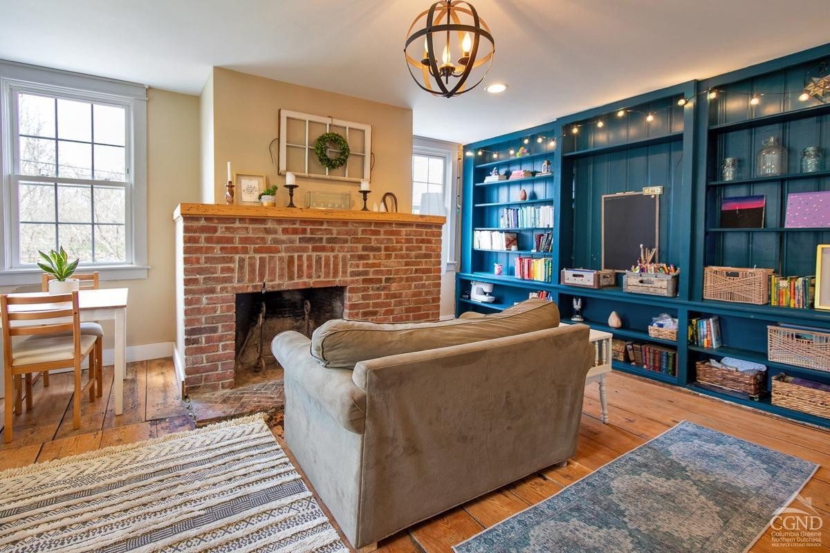0 3327 Route 199 Pine Plains, NY 12567 - Photo 15 of 43 a living room with furniture and a fireplace