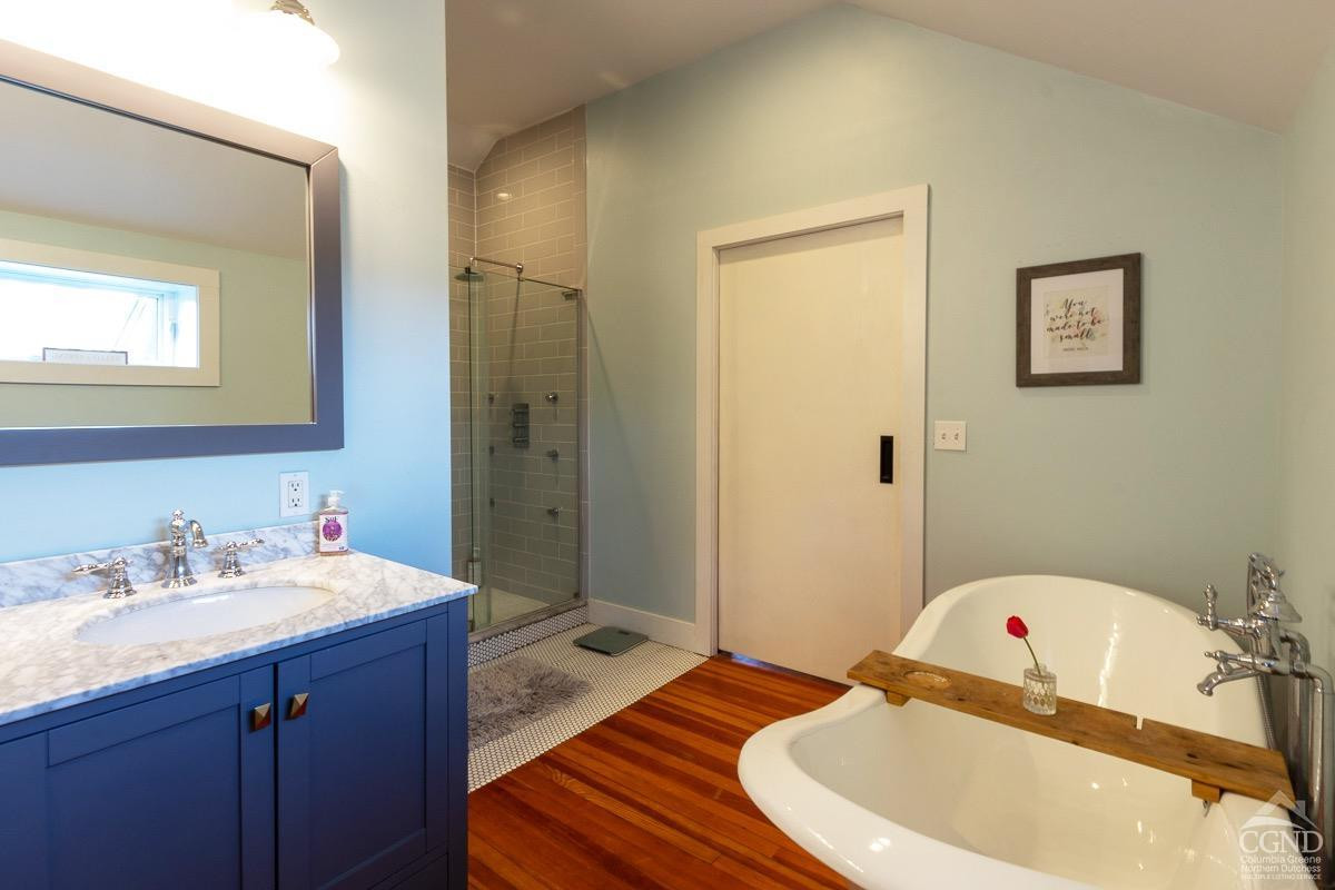 0 3327 Route 199 Pine Plains, NY 12567 - Photo 22 of 43 a bathroom with a sink a mirror and a toilet