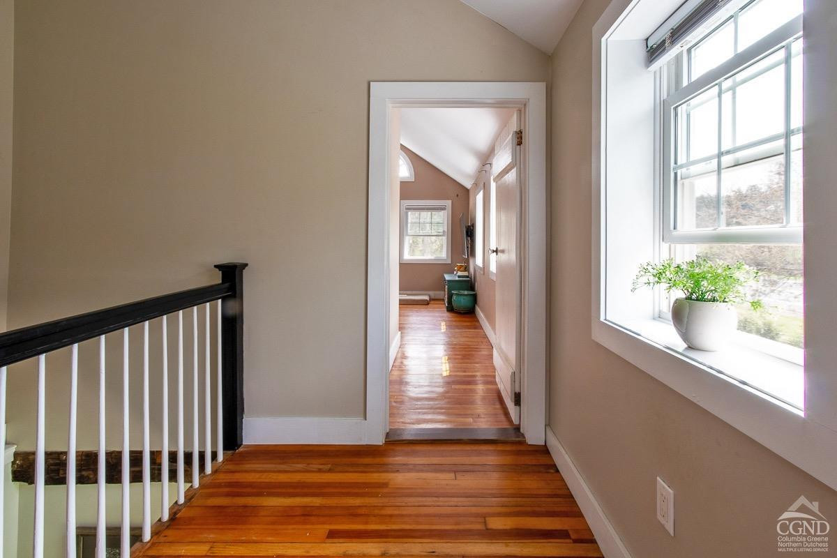 0 3327 Route 199 Pine Plains, NY 12567 - Photo 25 of 43 a view of a hallway view with wooden floor and staircase