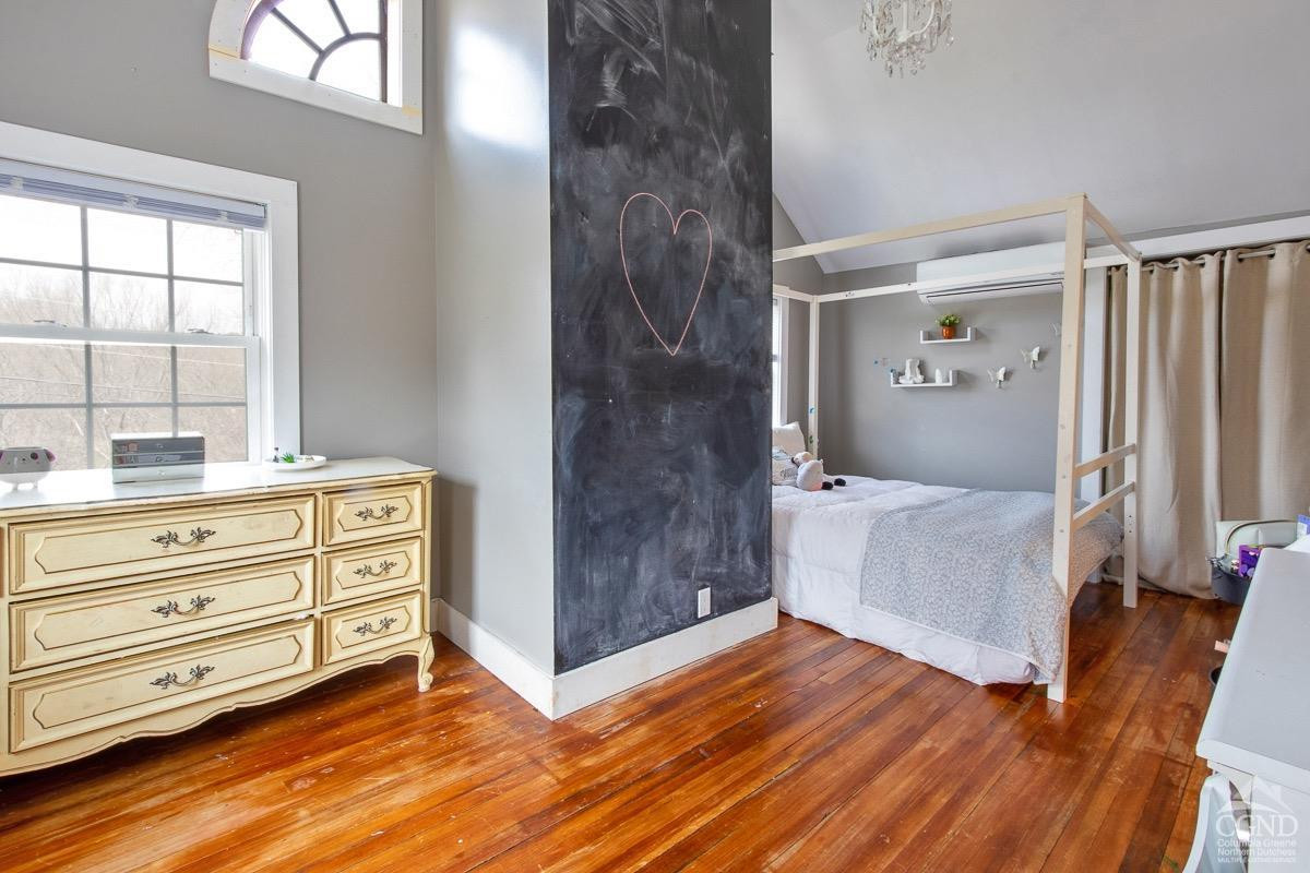 0 3327 Route 199 Pine Plains, NY 12567 - Photo 27 of 43 a room with a dresser and a window