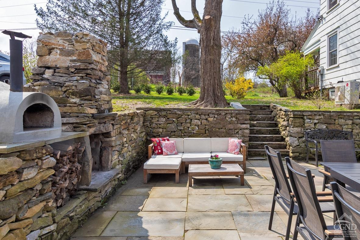 0 3327 Route 199 Pine Plains, NY 12567 - Photo 32 of 43 a view of backyard with seating space and trees
