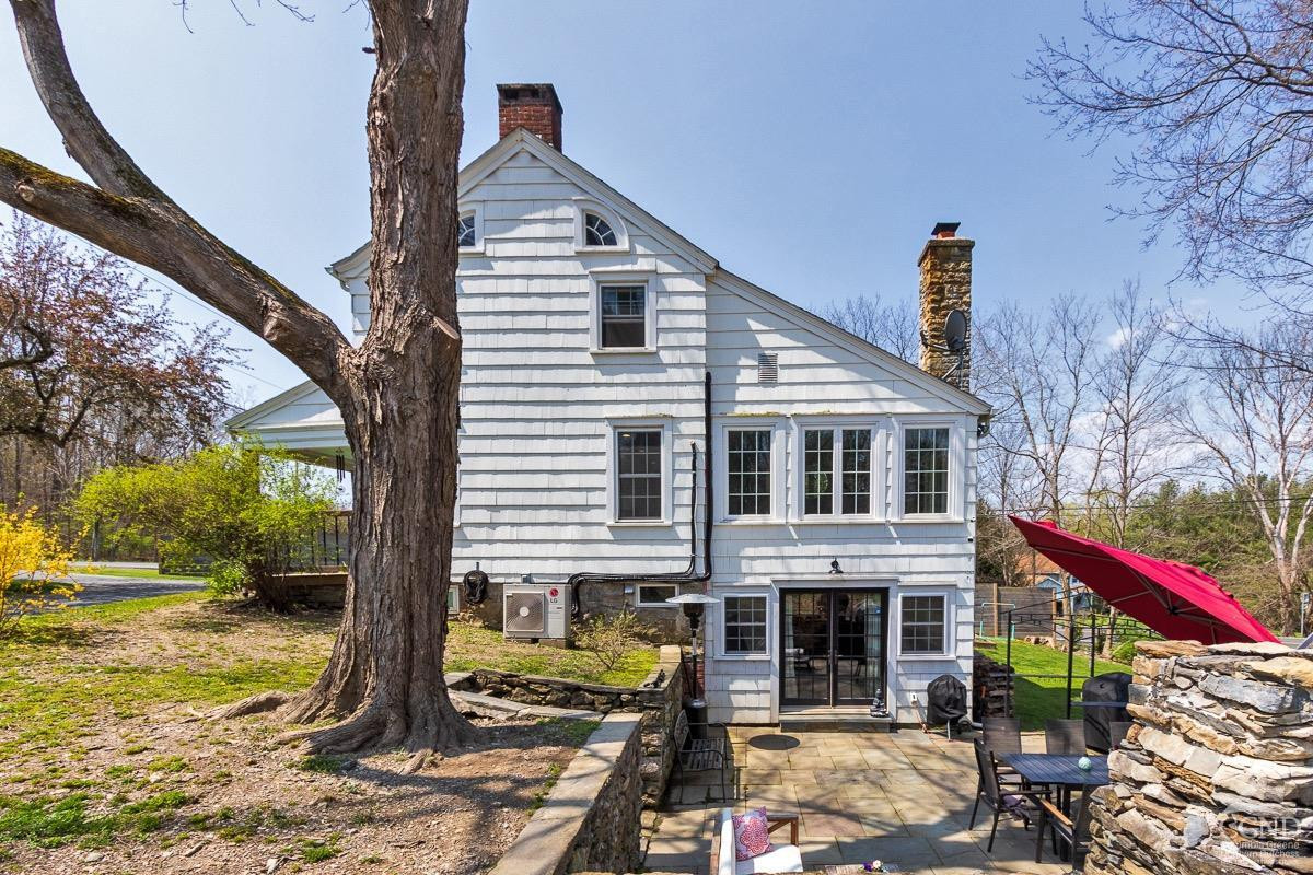 0 3327 Route 199 Pine Plains, NY 12567 - Photo 41 of 43 a front view of a house with garden
