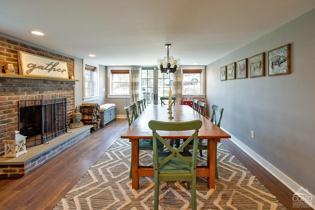0 3327 Route 199 Pine Plains, NY 12567 - Photo 8 of 43 a view of a dining room with furniture window and wooden floor