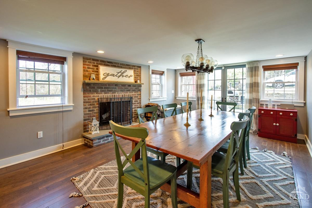 0 3327 Route 199 Pine Plains, NY 12567 - Photo 9 of 43 a view of a dining room with furniture wooden floor and chandelier