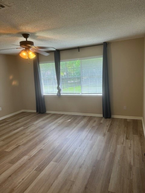 6026 Coral Ridge Road Houston, TX 77069 - Photo 19 of 34 Primary bedroom with lots of natural light and space.