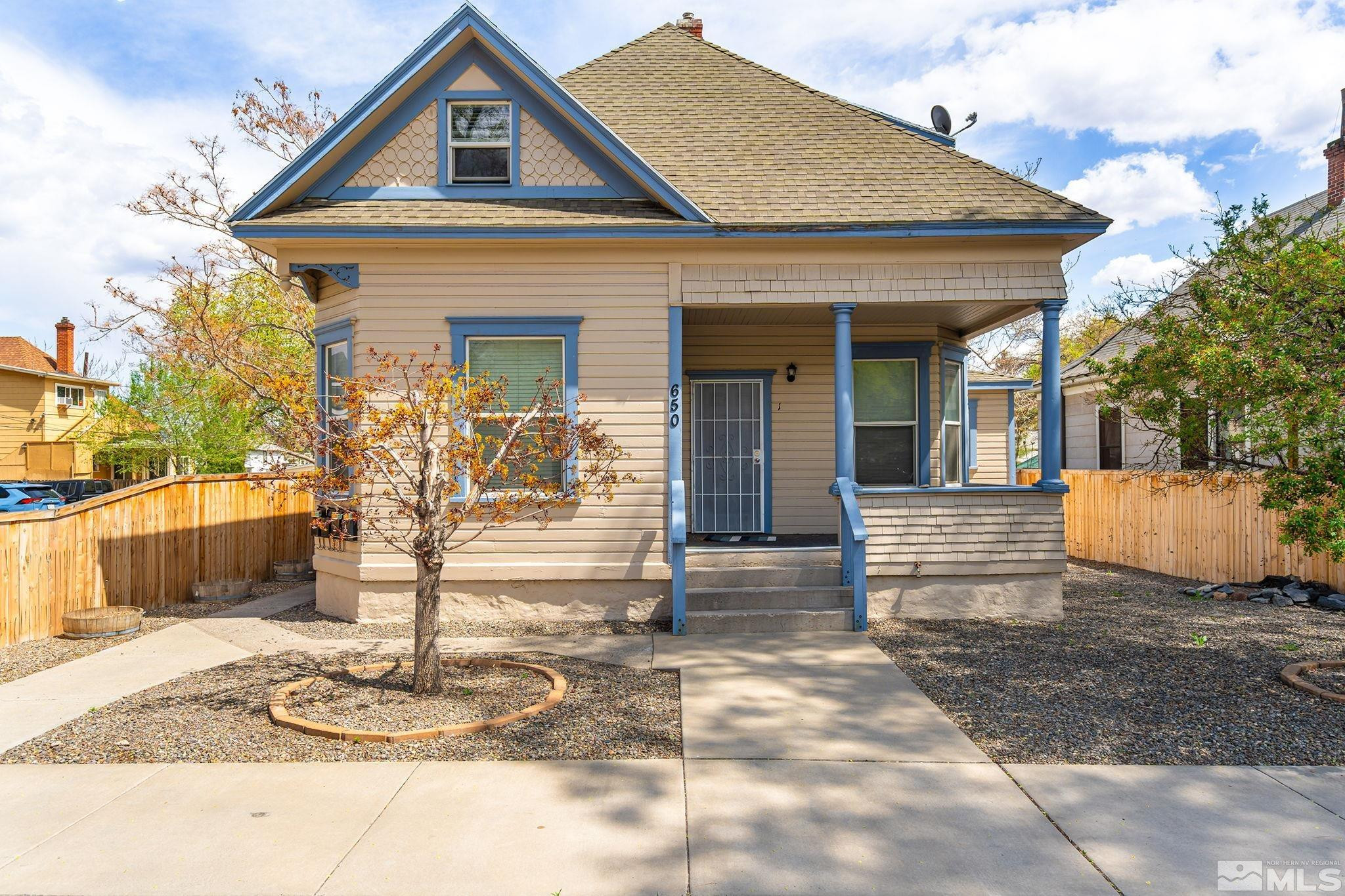 650 Elko Avenue Reno, NV 89512 - Photo 1 of 27 a front view of a house with a porch