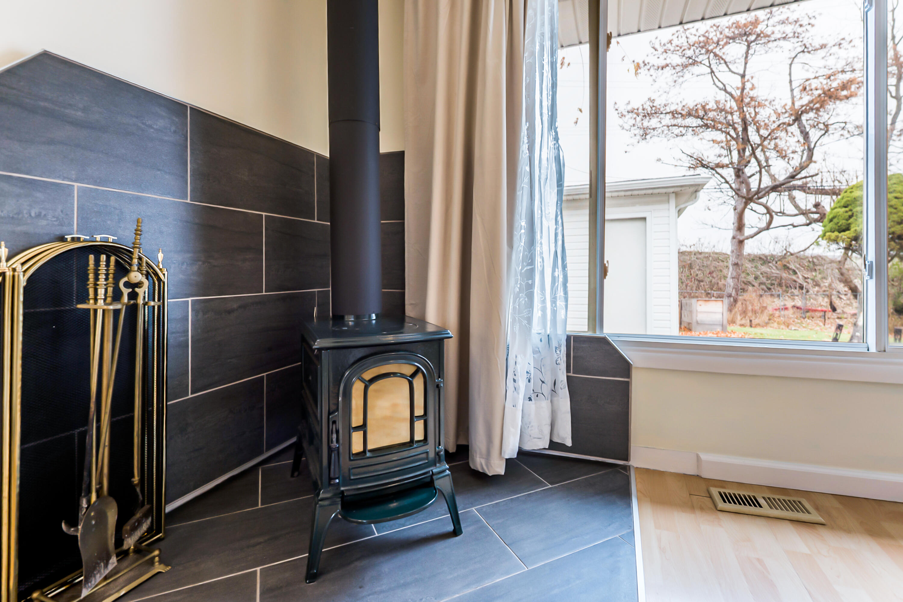 2831 Canterbury Road Ann Arbor, MI 48104 - Photo 5 of 27 Wood burning stove