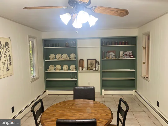 a kitchen with a sink cabinets and window