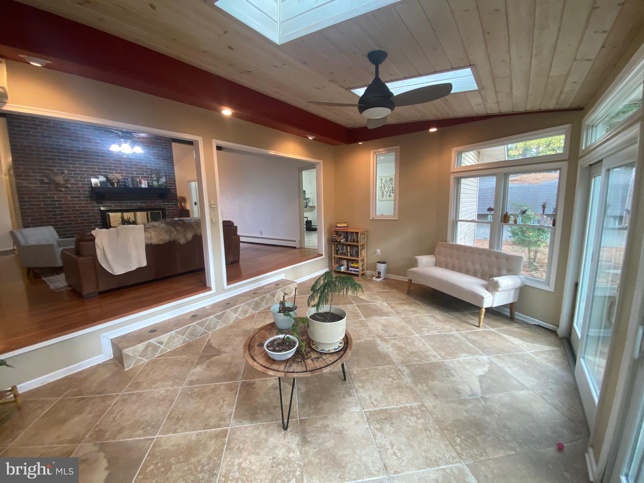 117 West Adams Street Georgetown, DE 19947 - Photo 3 of 20 a living room with furniture and a chandelier