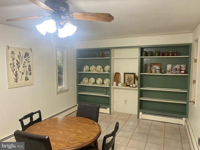 a room with furniture and a window