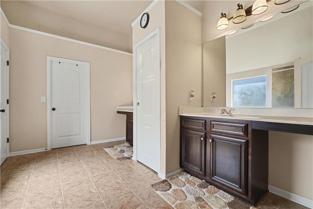 4157 Sublime Trail Atlanta, GA 30349 - Photo 16 of 20 a view of kitchen with granite countertop cabinets and refrigerator