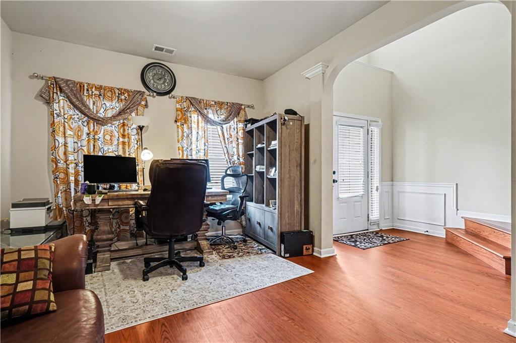 4157 Sublime Trail Atlanta, GA 30349 - Photo 3 of 20 a view of a workspace with furniture and a window