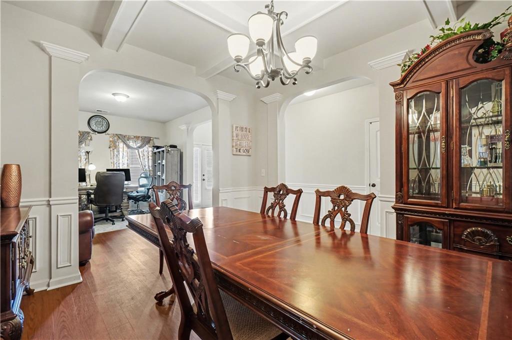 4157 Sublime Trail Atlanta, GA 30349 - Photo 4 of 20 a view of a dining room with furniture window and wooden floor