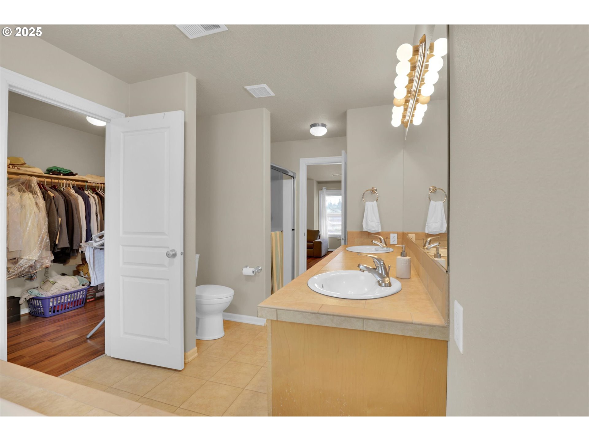 3718 Southeast 127th Place Portland, OR 97236 - Photo 29 of 31 a bathroom with a sink and a mirror