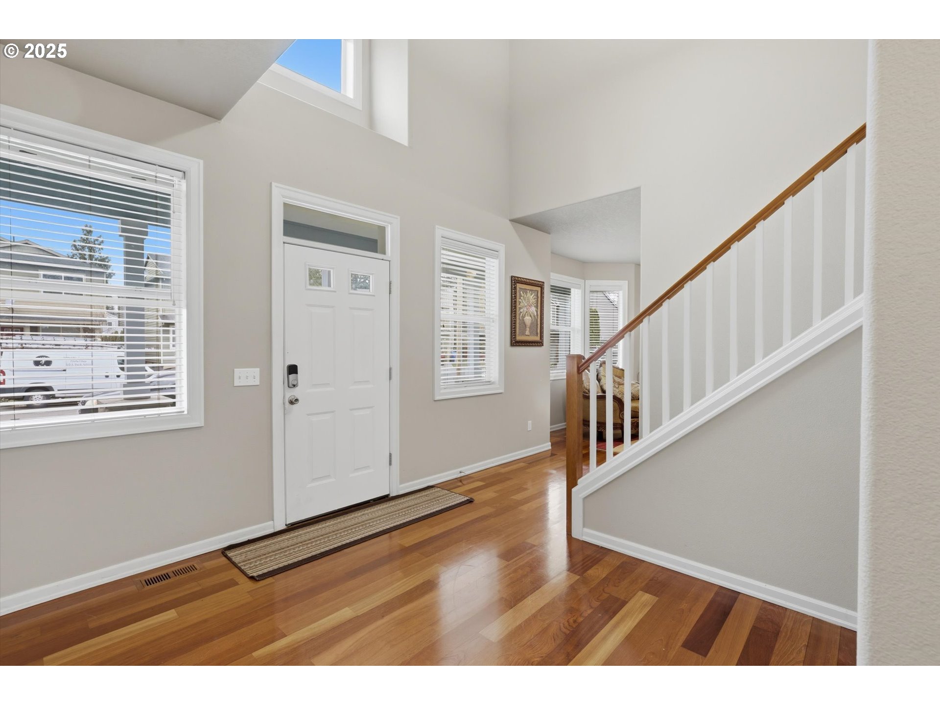 3718 Southeast 127th Place Portland, OR 97236 - Photo 3 of 31 a view of an entryway with wooden floor