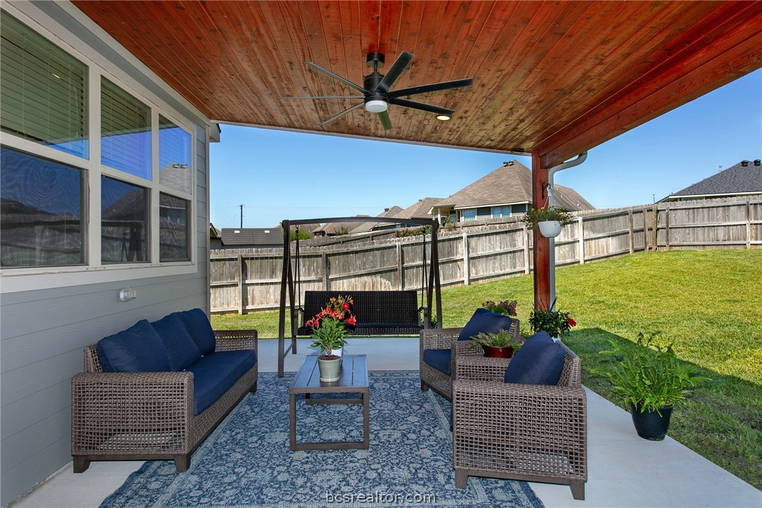 2071 Positano Loop Bryan, TX 77808 - Photo 26 of 31 a outdoor living space with furniture and garden view