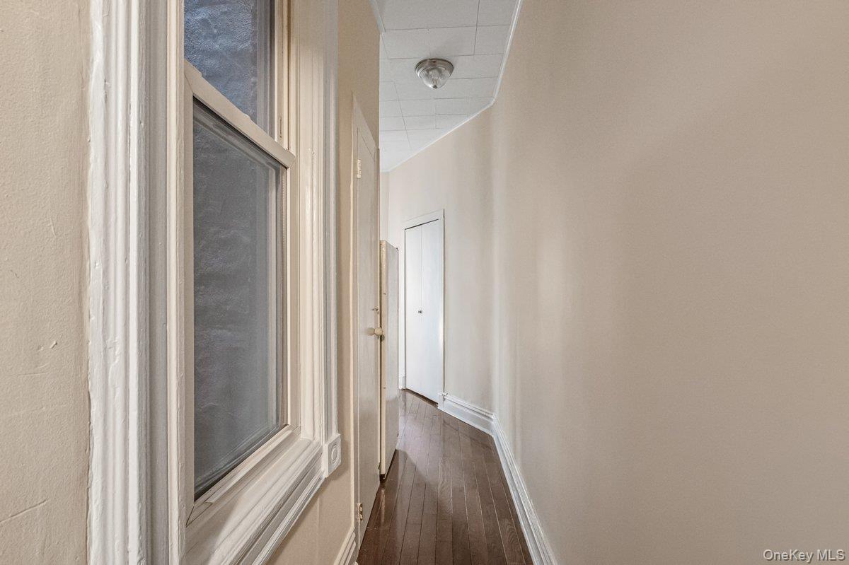 62 Sutton Street Brooklyn, NY 11222 - Photo 28 of 29 a view of a hallway with wooden floor and entryway