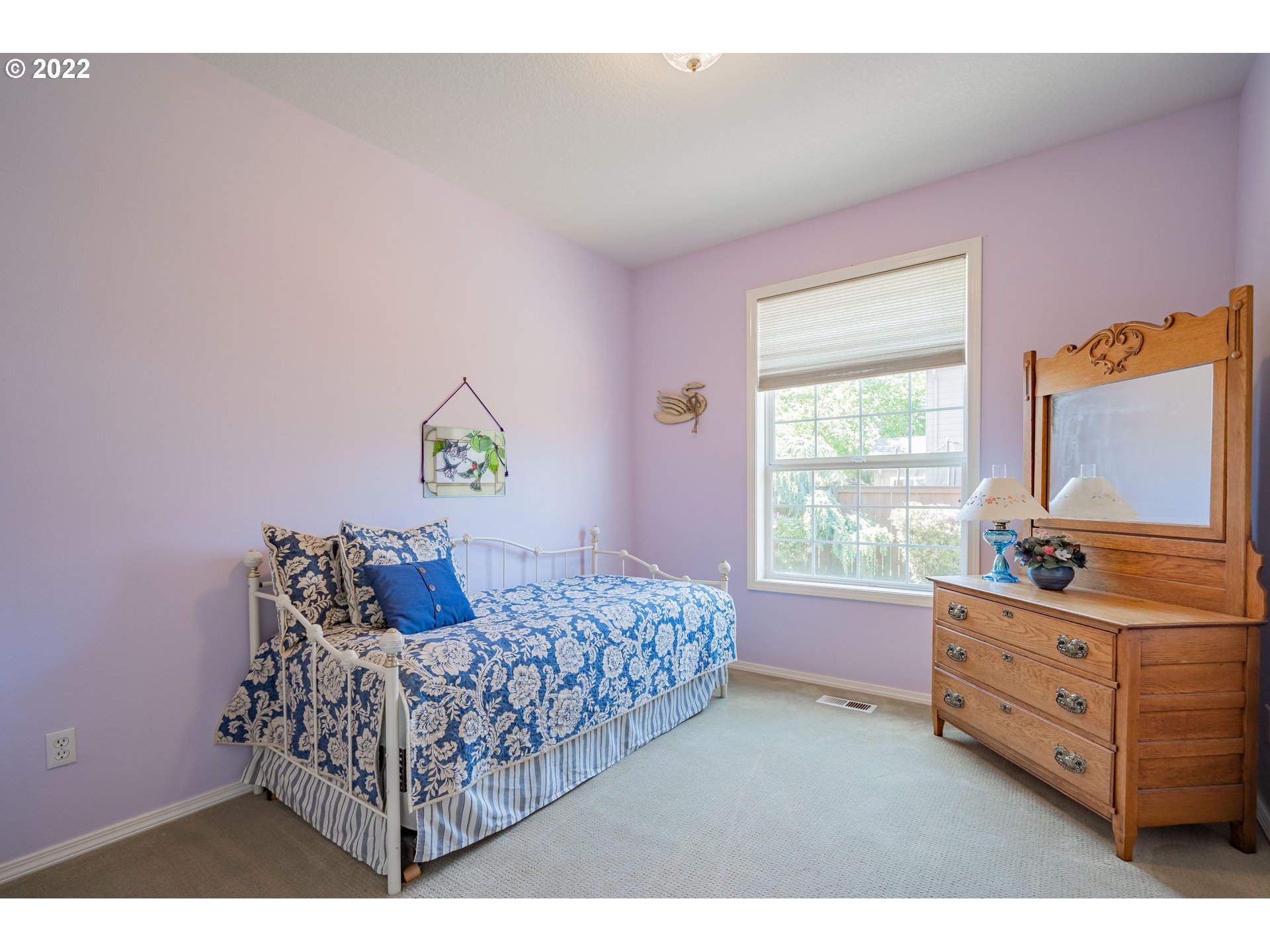 3711 Northwest 114th Street Vancouver, WA 98685 - Photo 17 of 32 a bedroom with a bed and a dresser in it