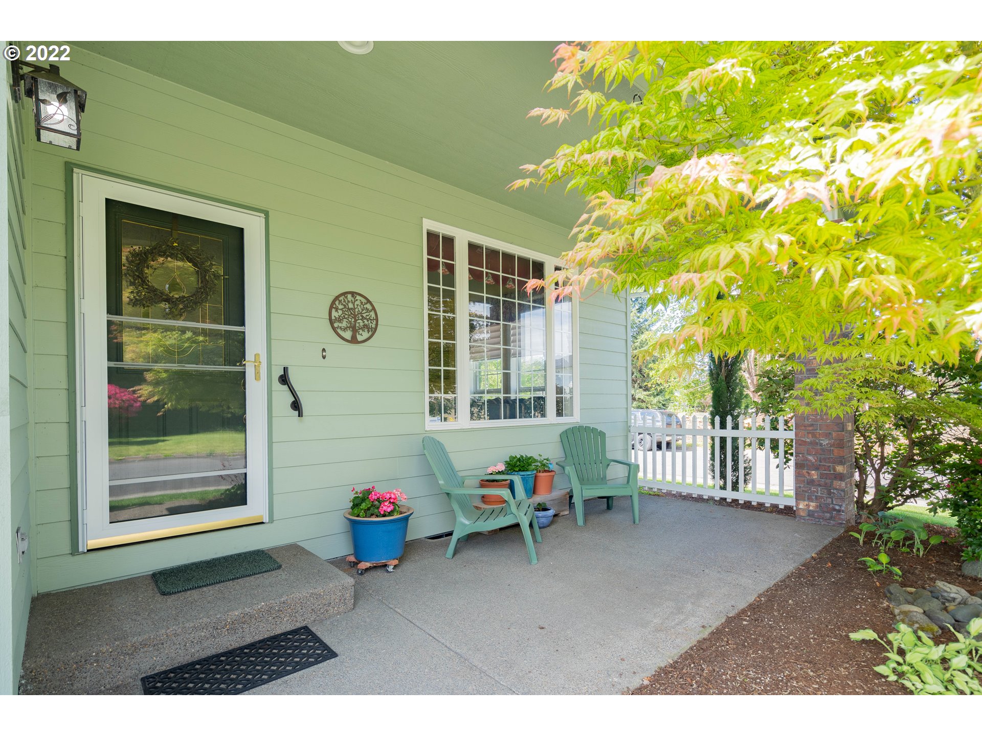 3711 Northwest 114th Street Vancouver, WA 98685 - Photo 2 of 32 a backyard of a house with table and chairs