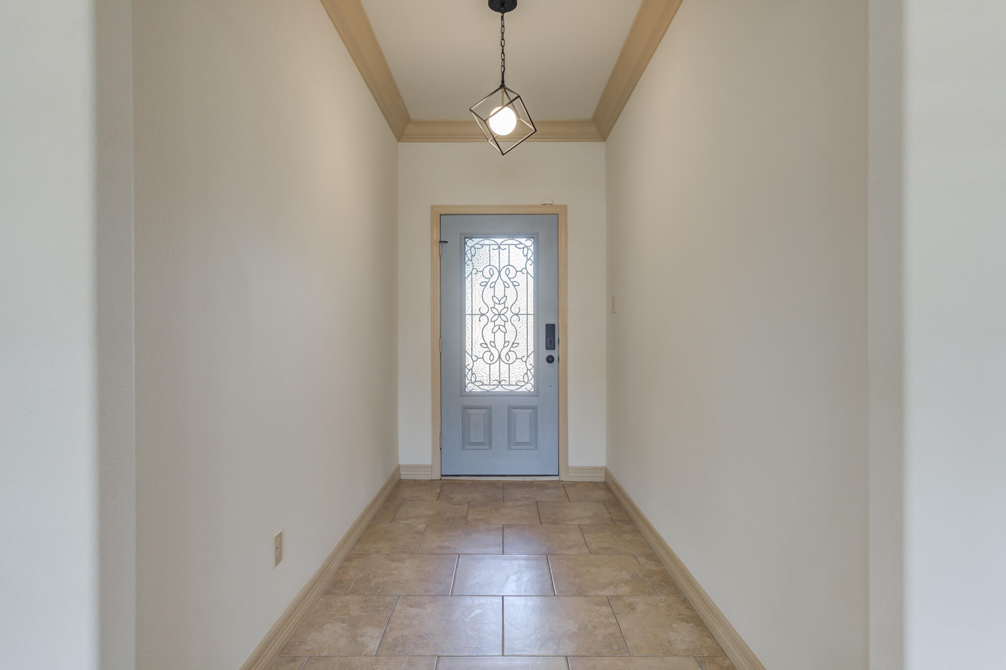 6509 72nd Street Lubbock, TX 79424 - Photo 2 of 40 a view of a hallway with windows