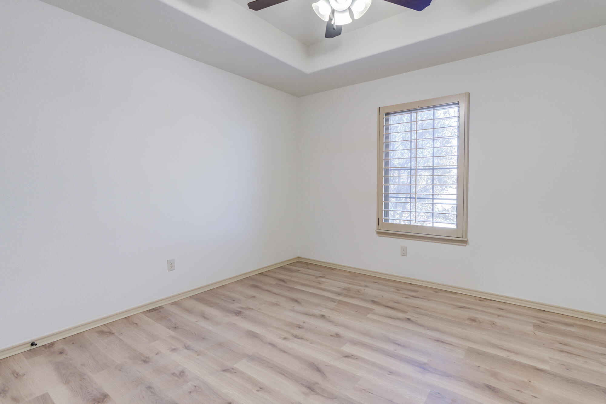 6509 72nd Street Lubbock, TX 79424 - Photo 25 of 40 an empty room with a window