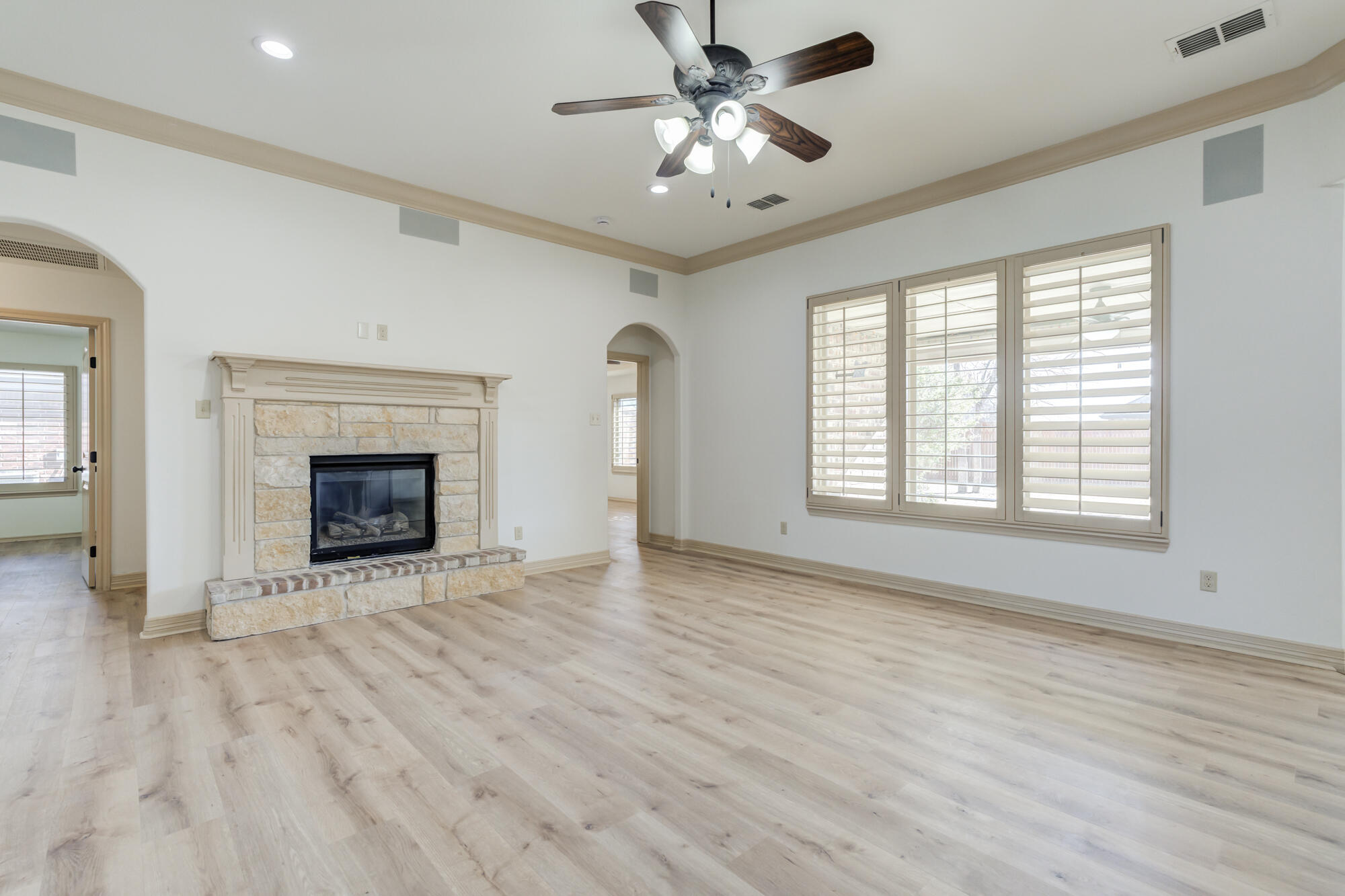6509 72nd Street Lubbock, TX 79424 - Photo 6 of 40 a view of an empty room with window and fire place
