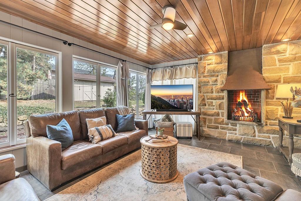 2 Davidson Drive Beaver Falls, PA 15010 - Photo 13 of 25 a living room with furniture a flat screen tv and a large window