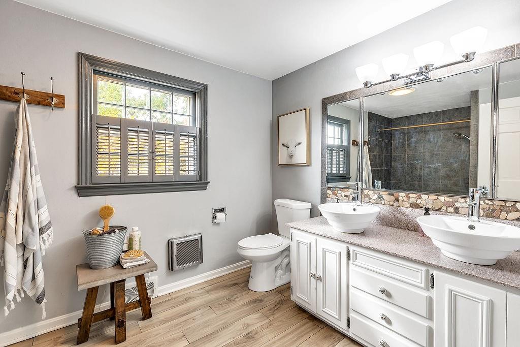 2 Davidson Drive Beaver Falls, PA 15010 - Photo 15 of 25 a bathroom with a sink vanity and a toilet