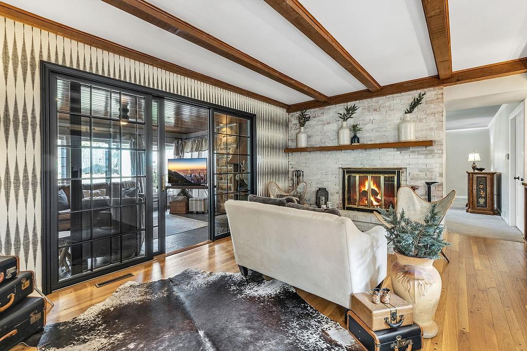 2 Davidson Drive Beaver Falls, PA 15010 - Photo 4 of 25 a living room with furniture a wooden floor and next to a window