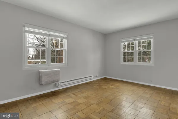 an empty room with windows