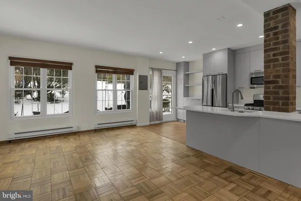 a view of kitchen and living room