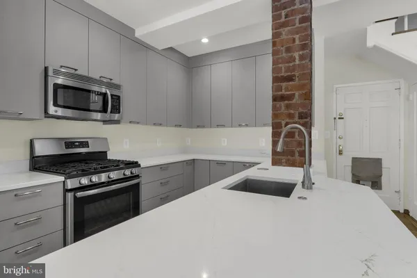 a bathroom with a toilet and a sink